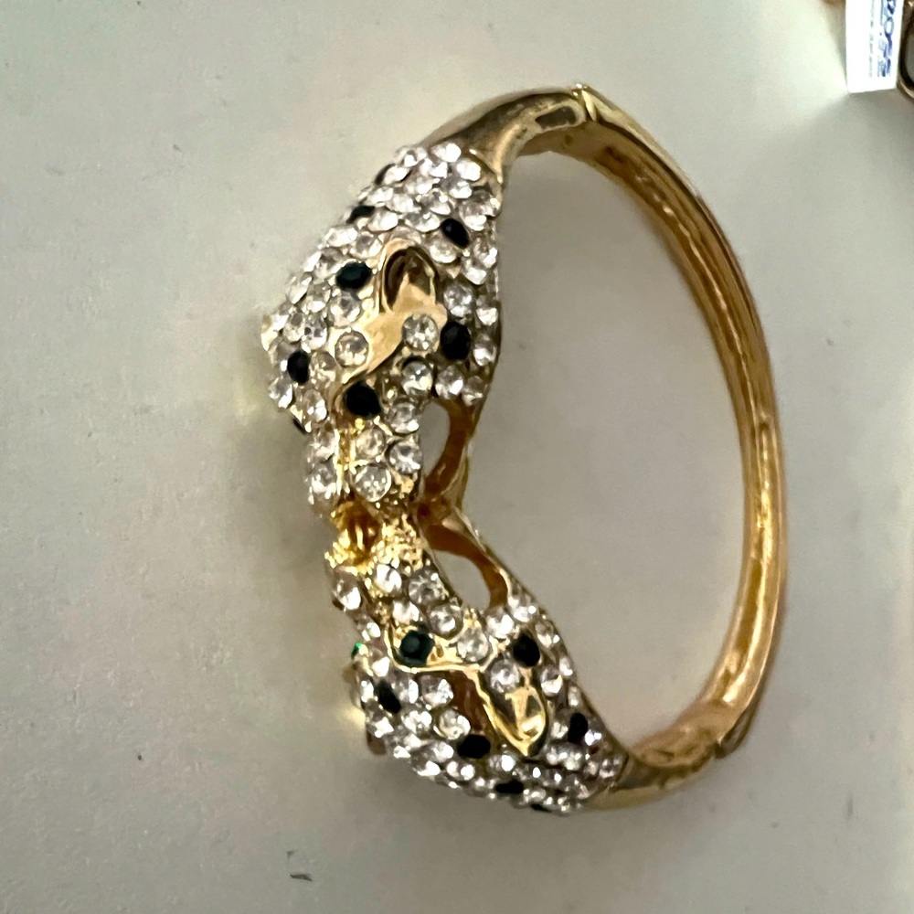 Gold tone heavy jaguar bangle bracelet  like new women few times